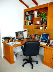 #377 Home office with two desks at opposite ends Finish: Maple with cherry stain and satin lacquer and laminate countertop